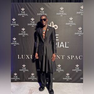 A custom made suit with the flare pant made for me, worn ones.